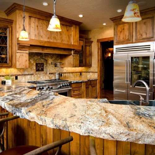 Rustic kitchen with thick granite, distressed cabi