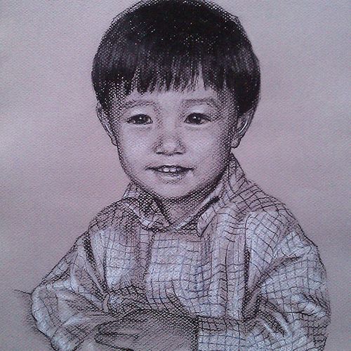Charcoal portrait of a child