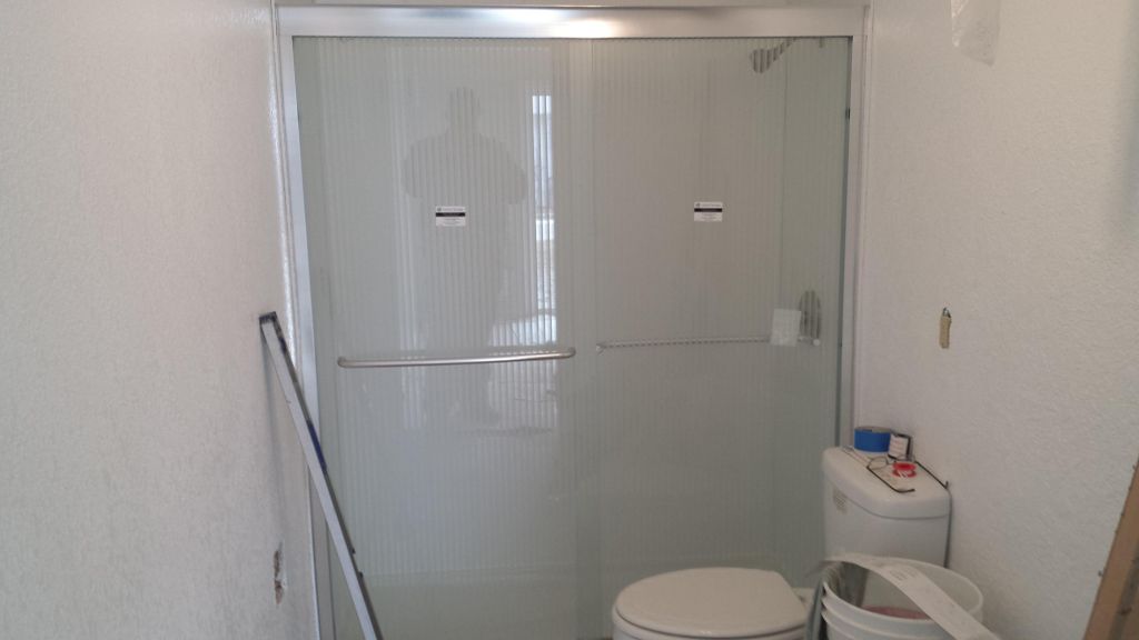 Small bathroom removed tub replaced with shower.