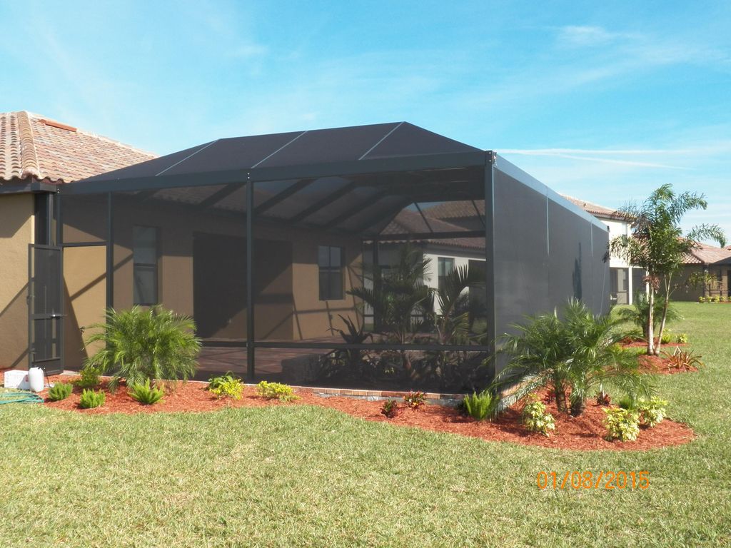 Paver Patio, Screened Lanai and Outside Landscapin