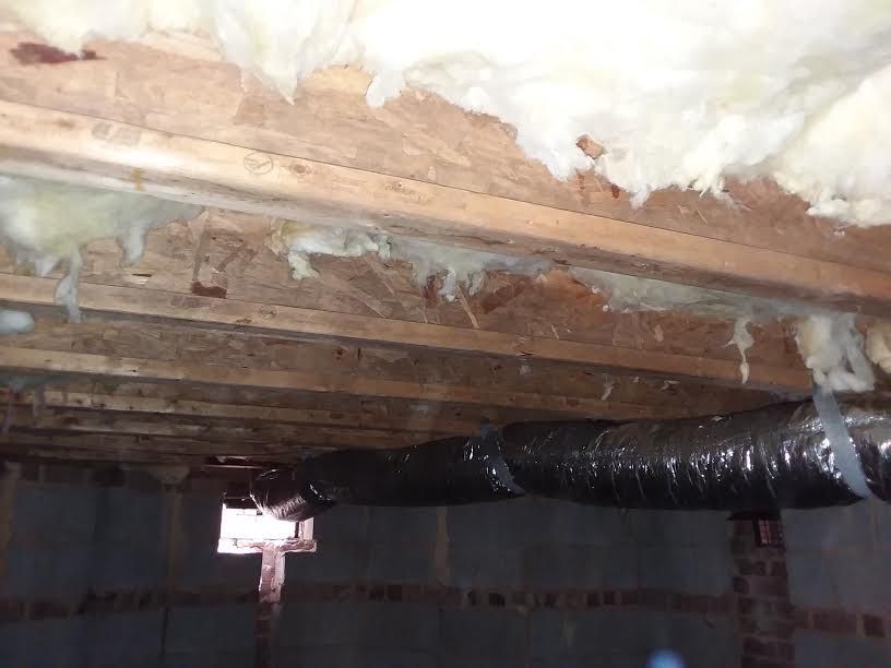 CRAWLSPACE BEFORE-Soggy INSULATION, lots of debris