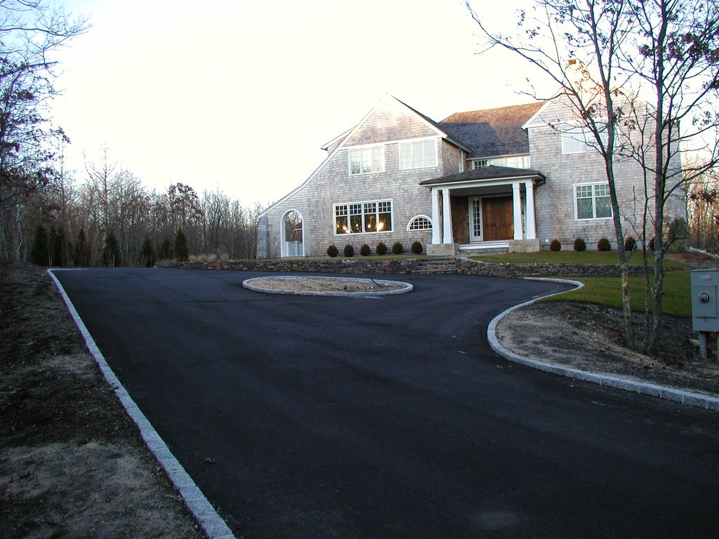 Asphalt driveway with belgium block edging
