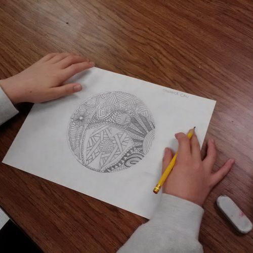 4th grade student works on meditative doodles.  Th