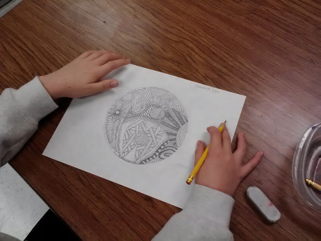 4th grade student works on meditative doodles.  Th