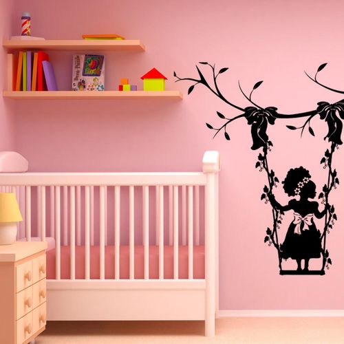 Wall decal of small afro child in swing. Get your 