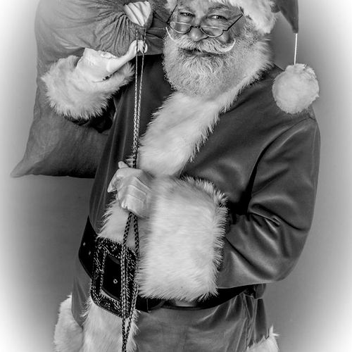 Traditional Santa Claus on 34th Street bringing gi