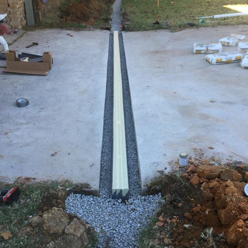 This is a french drain system couple with a channe