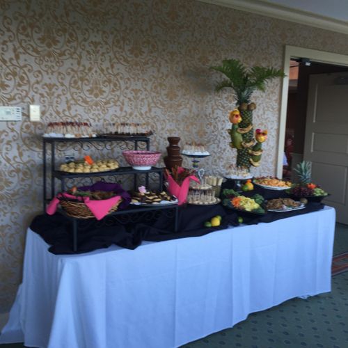 the complete tropical theme dessert display.