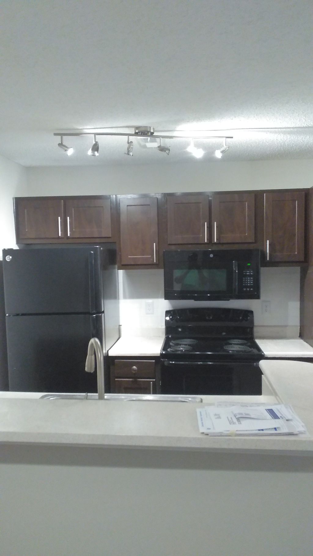 After  

Cabinet doors, hardware,microwave, range,
