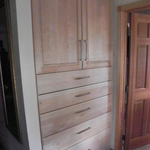 This is a maple linen cabinet. The depth of this i