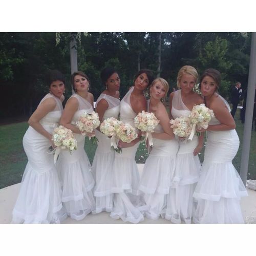 A beautiful group of bridesmaids acting silly!