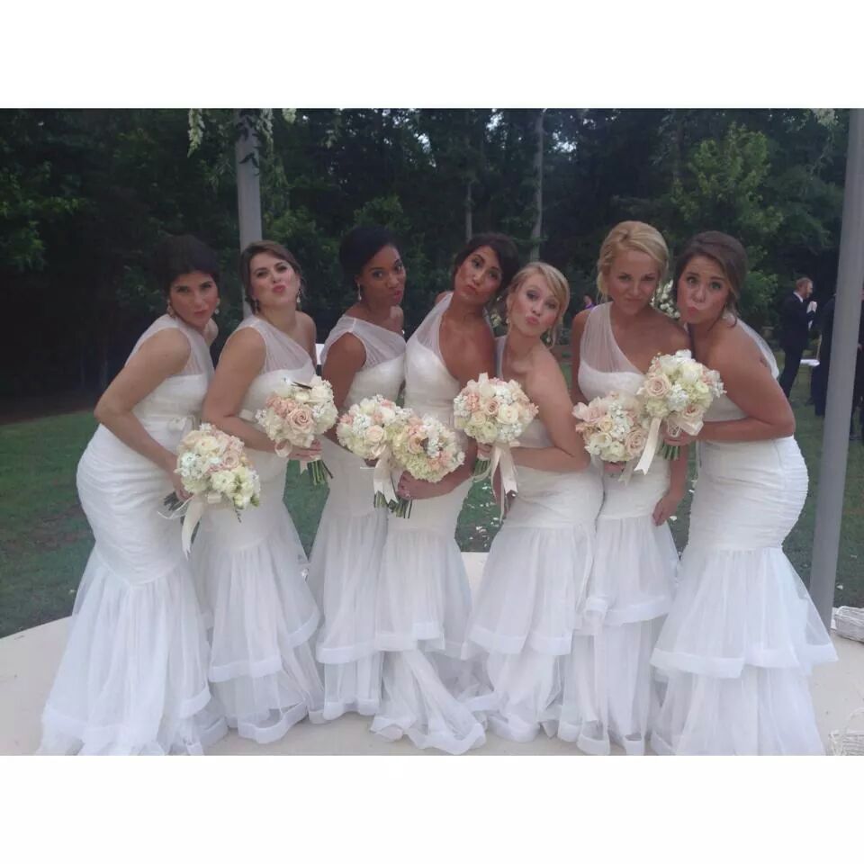 A beautiful group of bridesmaids acting silly!