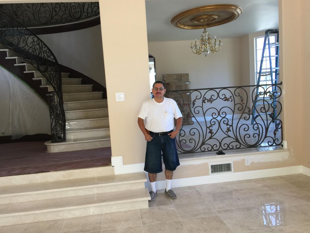 MARBLE INSTALLATION ON FLOOR AND GRANITE STEPS
