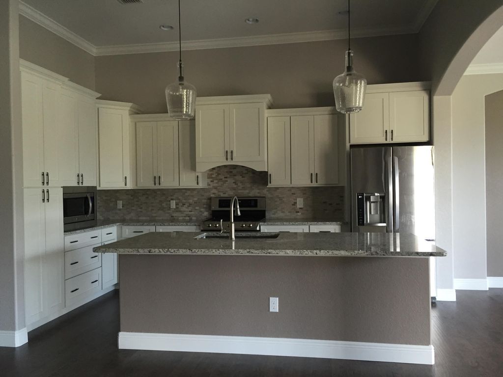 Cabinet and backsplash installation