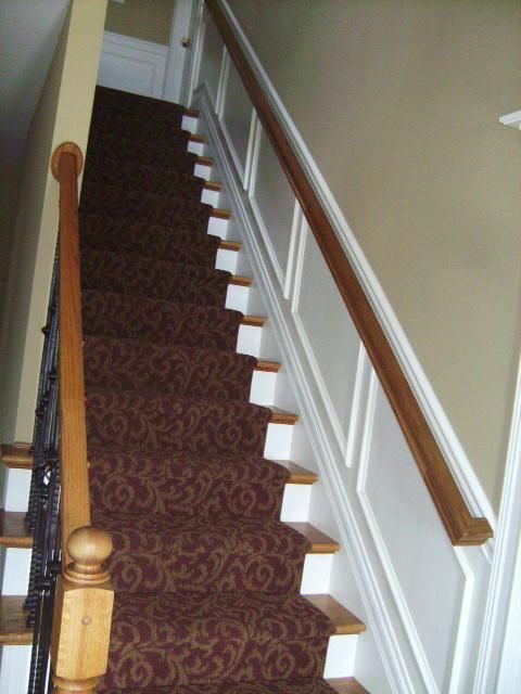 Wainscoting up stairwell, entryway, upper and lowe