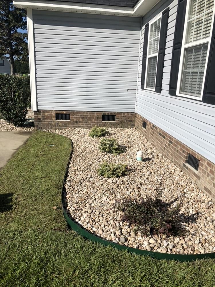 Shrubs and rocks with bordering 