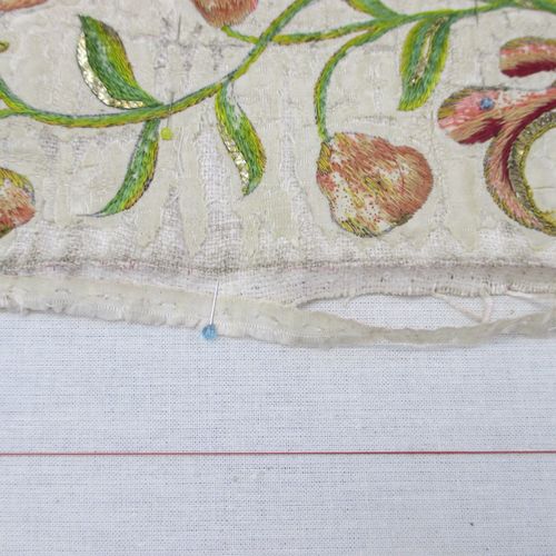 Detail shot of an antique stole being conserved. N