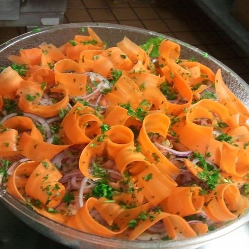 Tossed garden salad with carrot curls (a classic)
