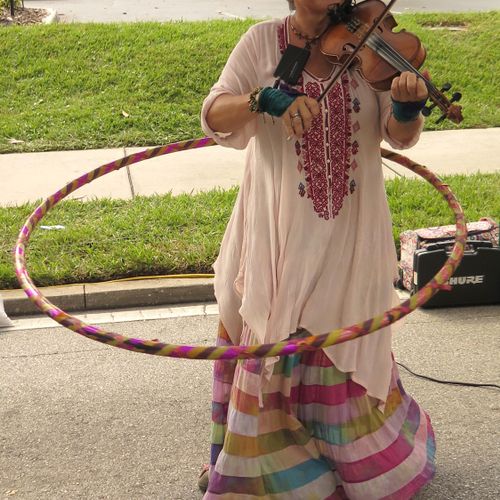 Yes, I hula hoop and fiddle at the same time. Seen