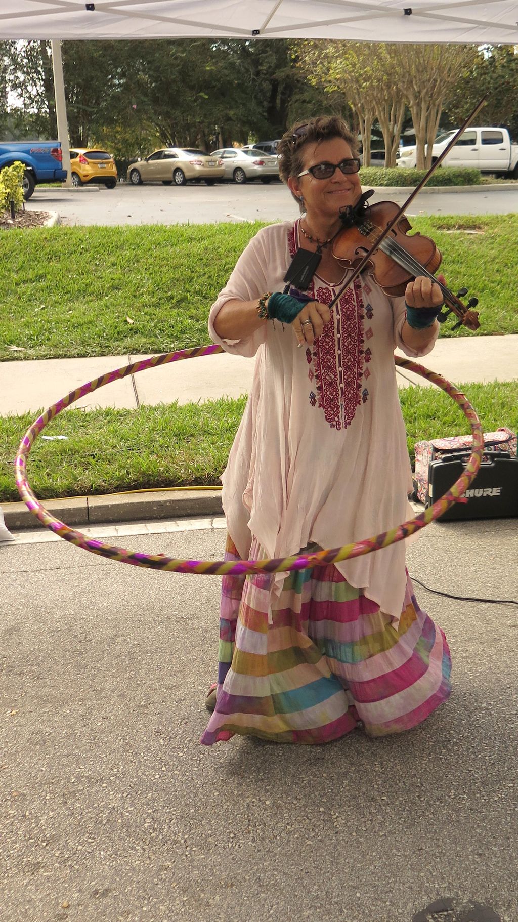 Yes, I hula hoop and fiddle at the same time. Seen