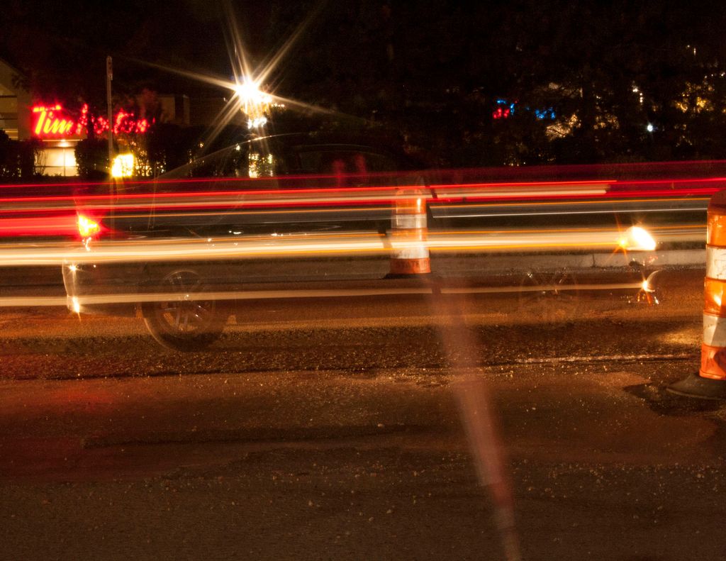Photograph of a moving car. The image was created 