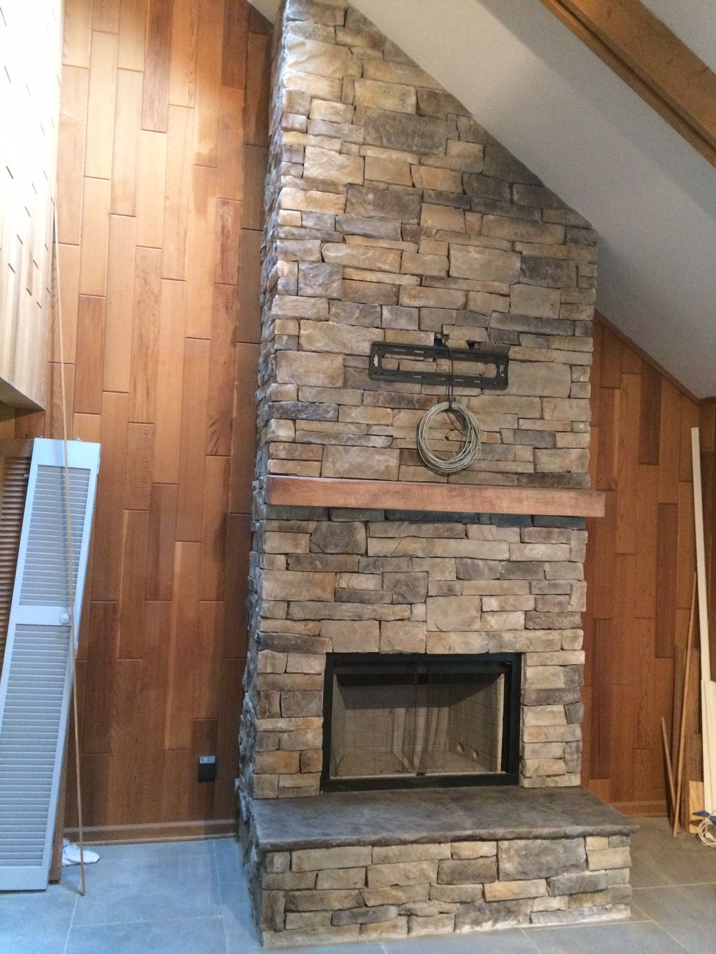 Installed this fireplace,stone, mantel .