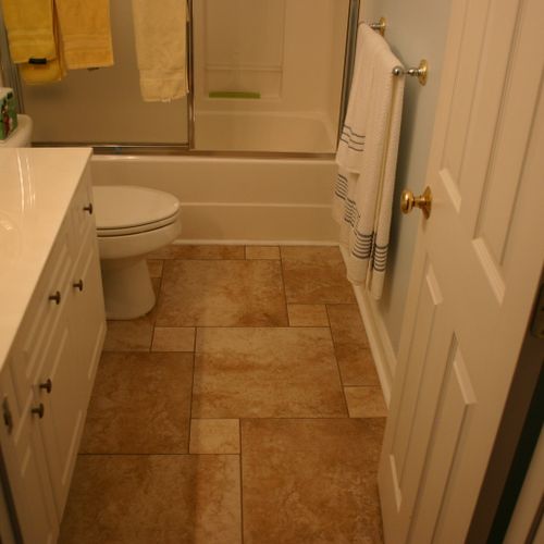 Pinwheel bathroom floor installed in Florence, SC.
