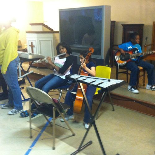 Dejarenee C. plays flute; Yohanna plays cello, Mar
