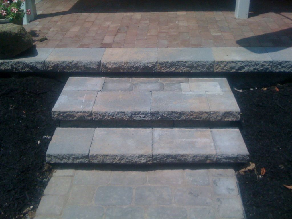 Red brick patio, & decorative block and  paver ste
