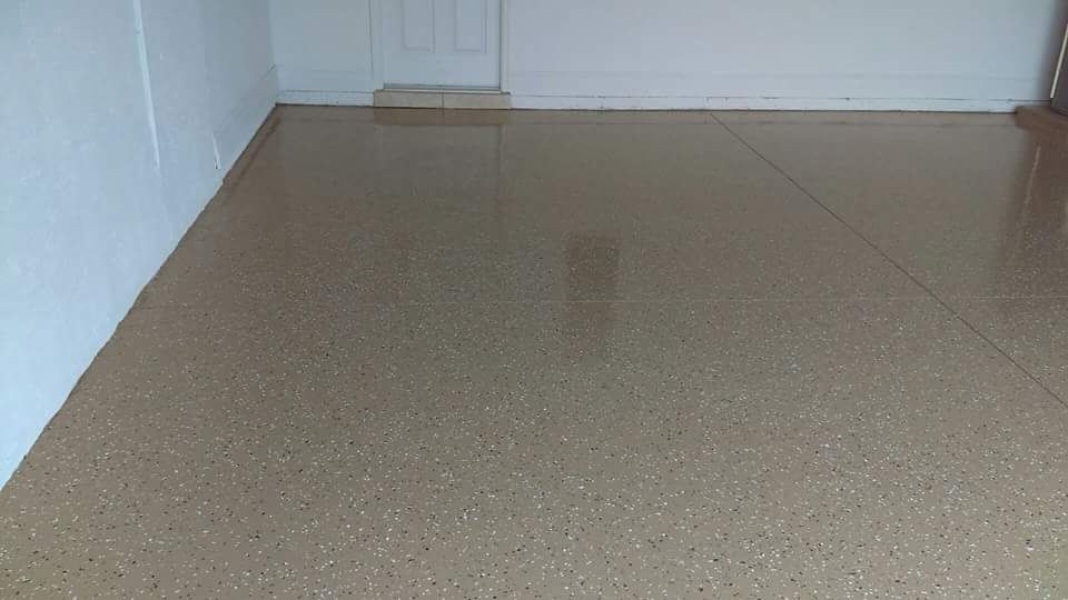 garage floor resurfaced with a 2 part epoxy floor 