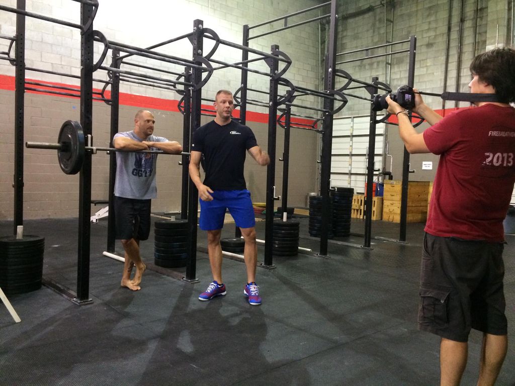 Filming a video on ankle mobility.