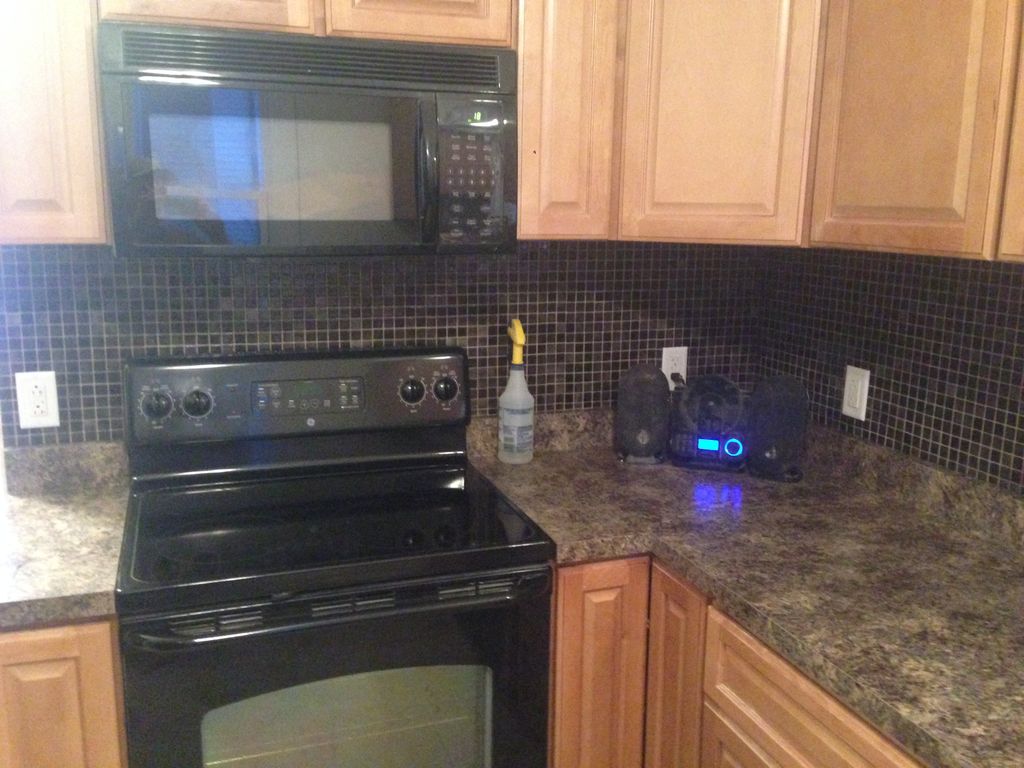 Small tile backsplash installed