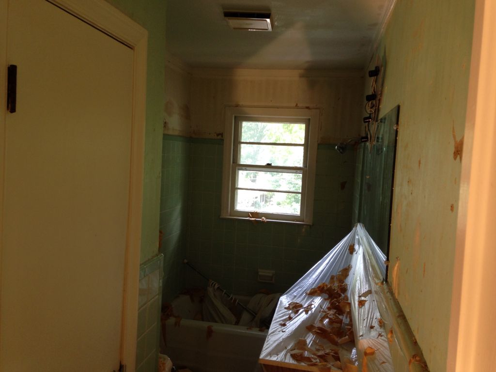 wall paper removal in a 1956 bathroom.