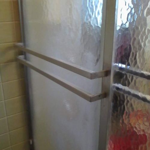 Shower doors before cleaning