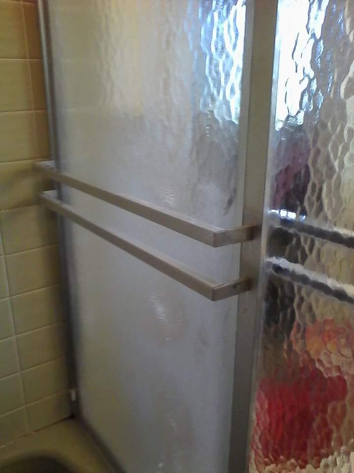 Shower doors before cleaning