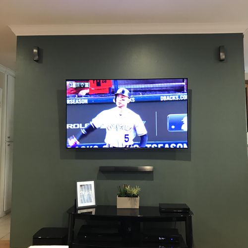 TV Mounted With Bose Surround Sound Installed. Wir