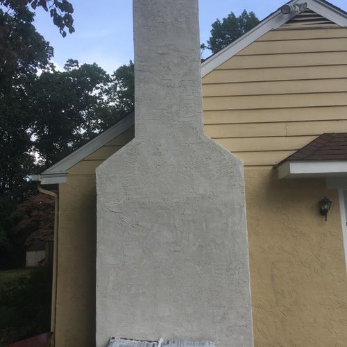 Block chimney wired and three coat stucco