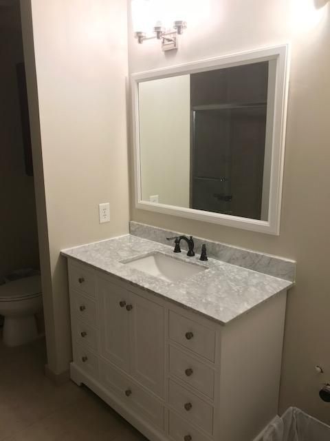 Bathroom furniture, fixtures & lighting moved & in