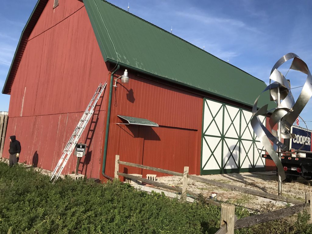 Power washed, scraped, patched and painted 