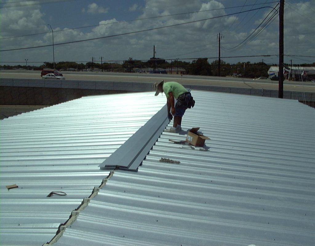Commercial metal roof replaced due to hail
