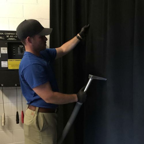 Jake cleaning curtains at Omaha's Baxter Arena!