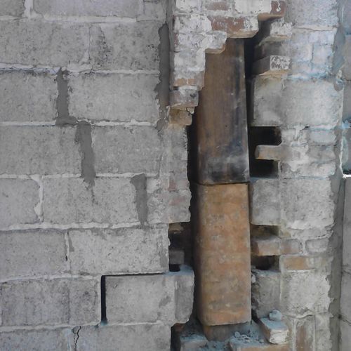 shifting foundation cracked across  chimney, rebui