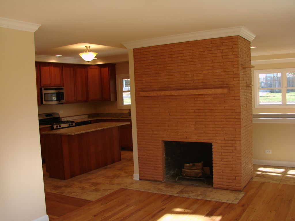 new kitchen, and view thru to converted garage to 