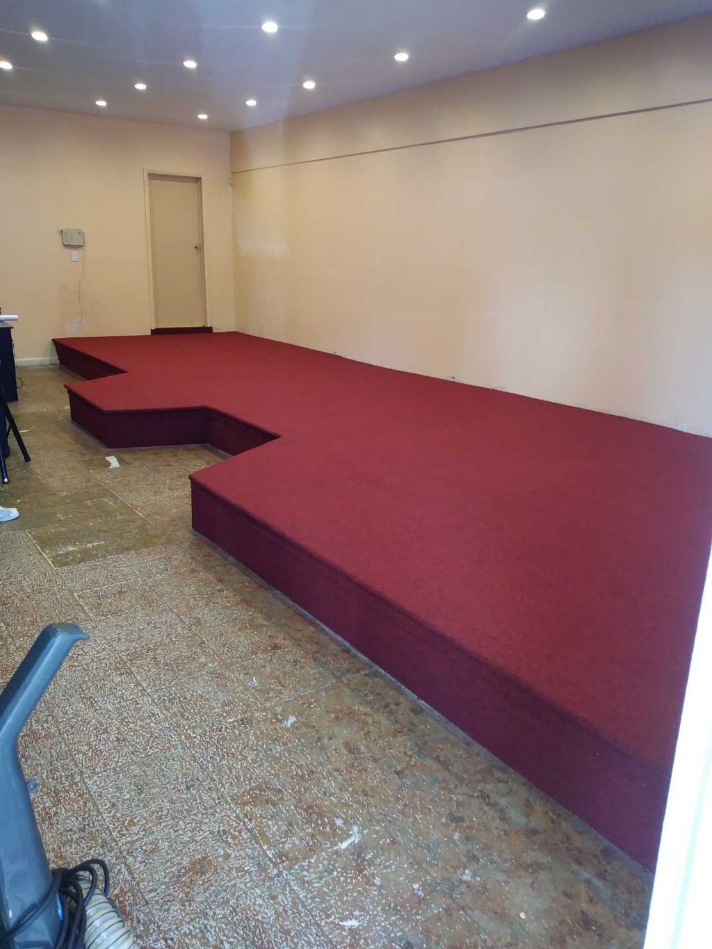 I built this stage and carpeted it