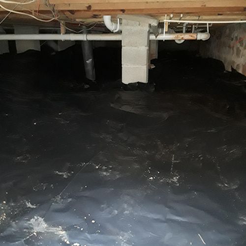 Cleaned crawl space, removed debris and installed 