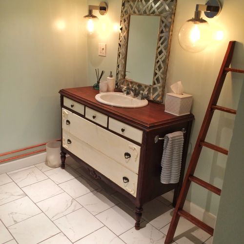 Antique dresser converted to bath vanity remodel. 
