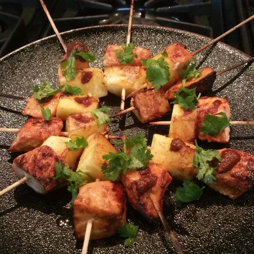 Chipolte salmon skewers with grilled pineapple.