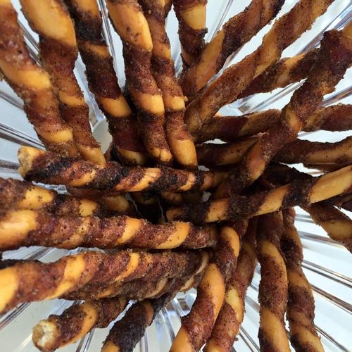 Sweet and spicy bacon wrapped breadsticks