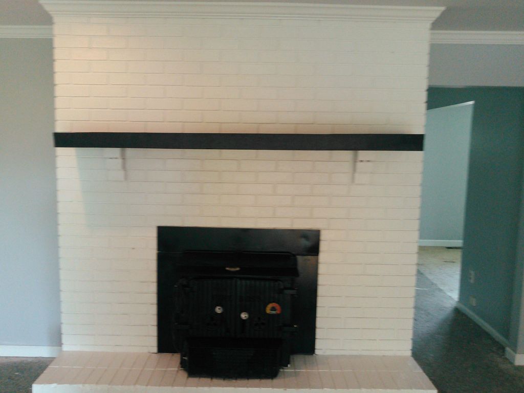 Brick fireplace painted 