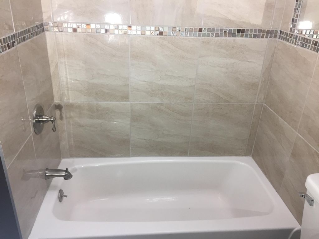 Detailed ceramic tiling and new control valves